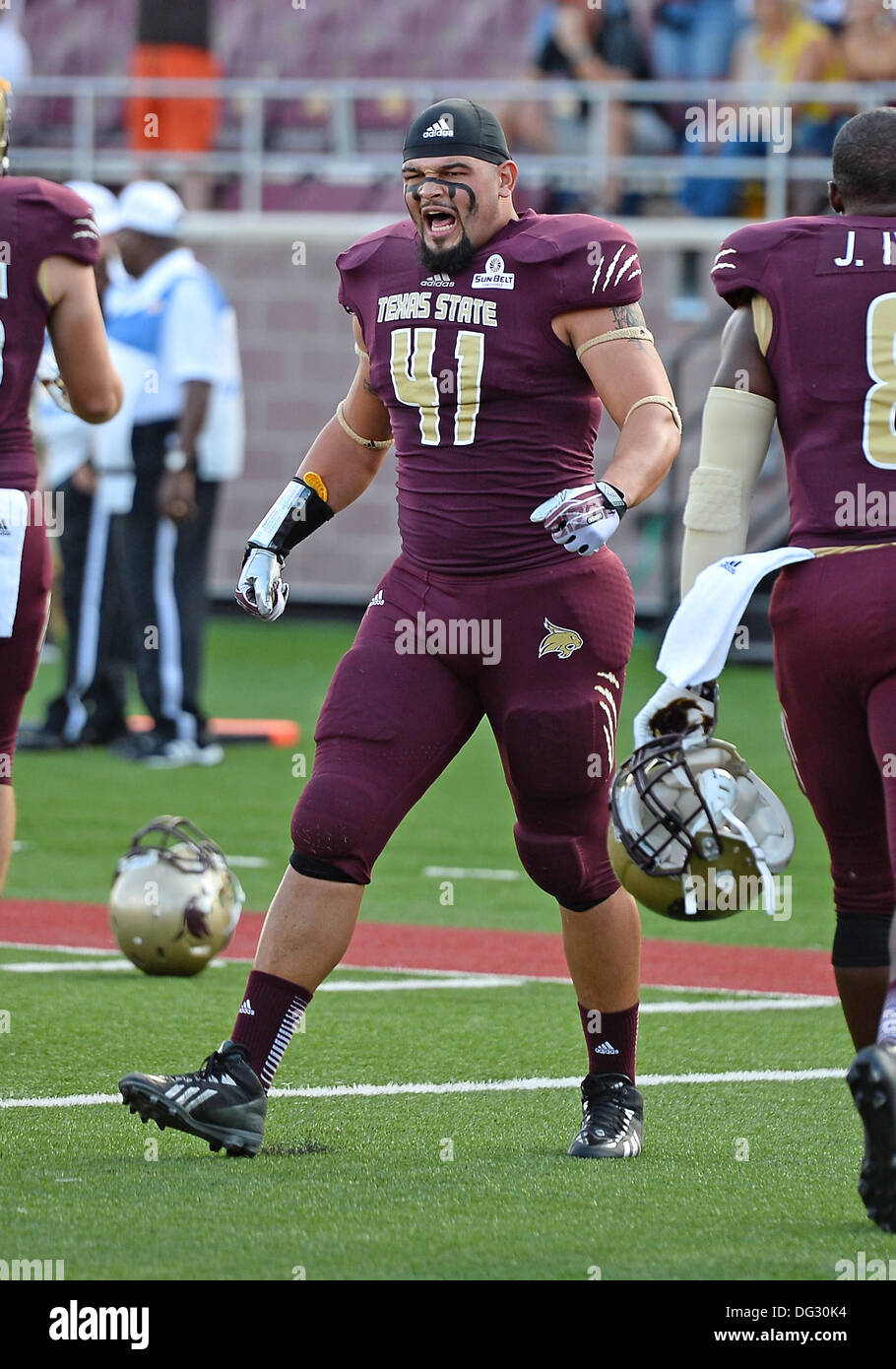 San Marcos, TX, USA. 12th Oct, 2013. Texas State defensive end Prestin Brown #41 reacts before NCAA football game kickoff at Jim Wacker Field in San Marcos, TX. ULM defeat Texas State 21-14. © csm/Alamy Live News Stock Photo