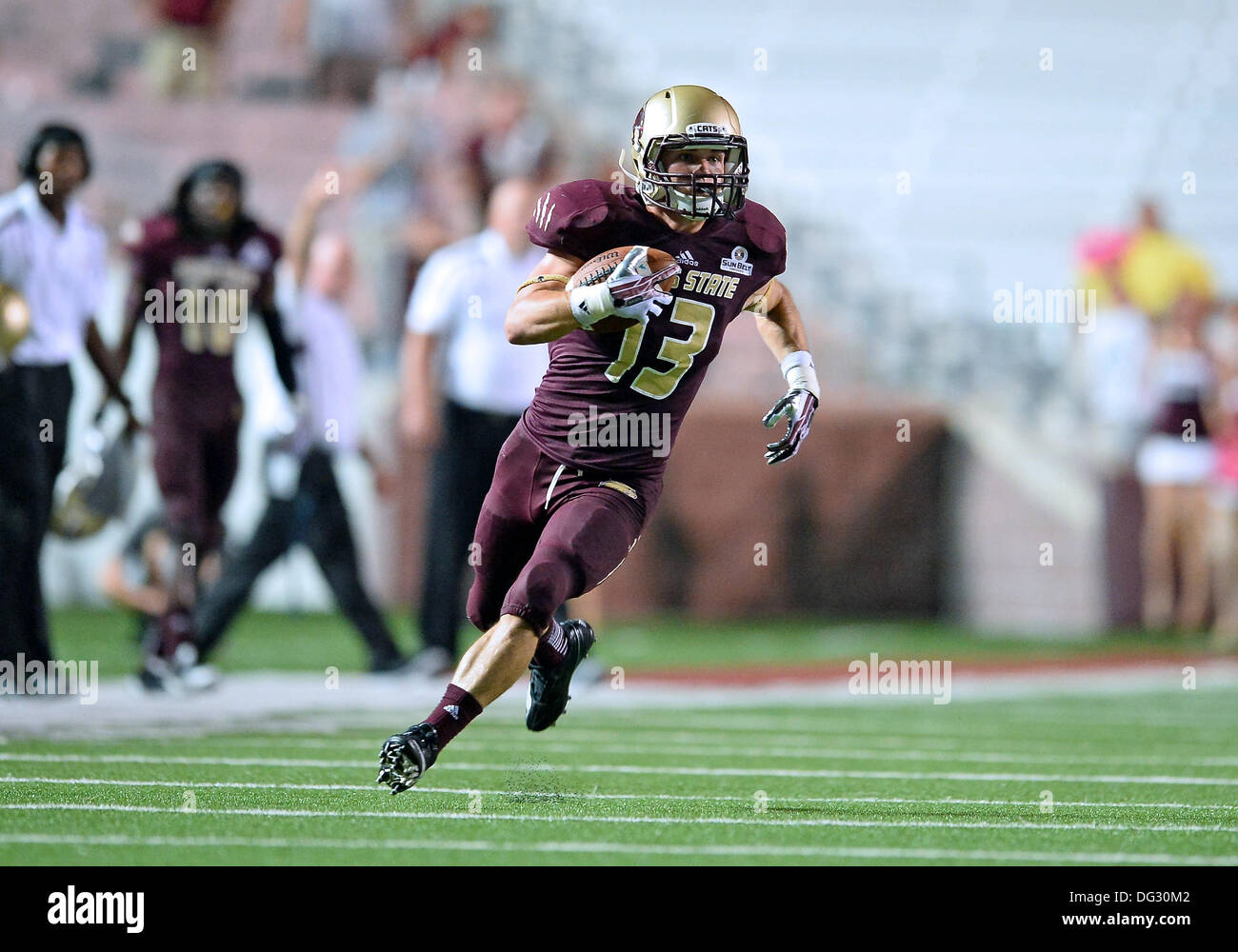 San Marcos, TX, USA. 12th Oct, 2013. Texas State wide receiver Andy Erickson #13 returns a kick during second half of NCAA football game at Jim Wacker Field in San Marcos, TX. ULM defeat Texas State 21-14. © csm/Alamy Live News Stock Photo