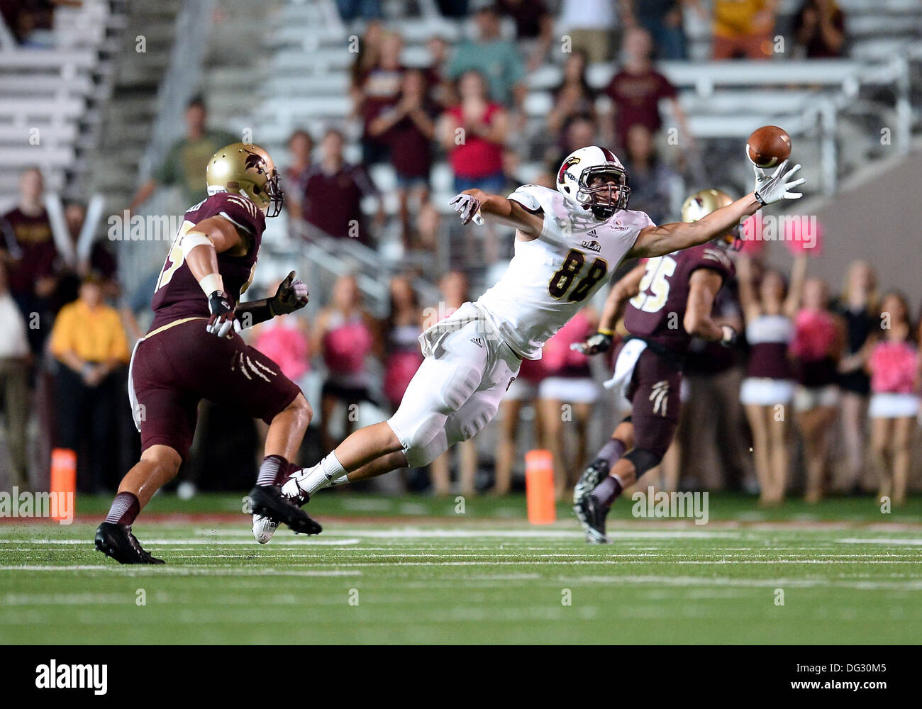 San Marcos, TX, USA. 12th Oct, 2013. ULM tight end Harley Scioneaux #88 leaps to catch a pass in the seond half of NCAA football game at Jim Wacker Field in San Marcos, TX. ULM defeat Texas State 21-14. © csm/Alamy Live News Stock Photo