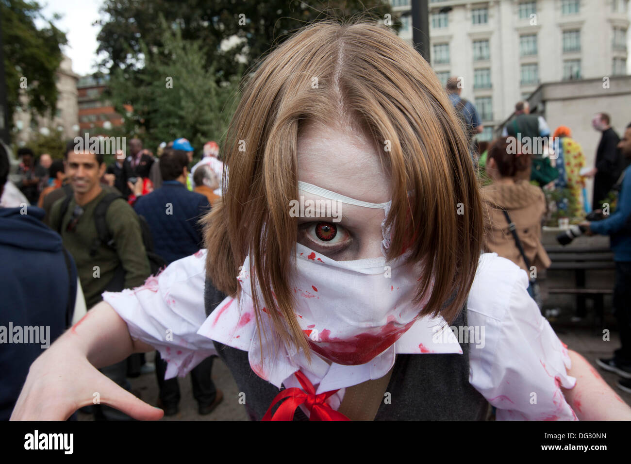 London, UK. 12th Oct 2013. London attracts thousands of zombies each year to groan and shamble through Central London in aid of the charity St. MungoÕs. Stock Photo