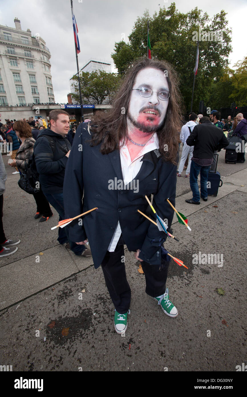 London, UK. 12th Oct 2013. London attracts thousands of zombies each year to groan and shamble through Central London in aid of the charity St. MungoÕs. Stock Photo