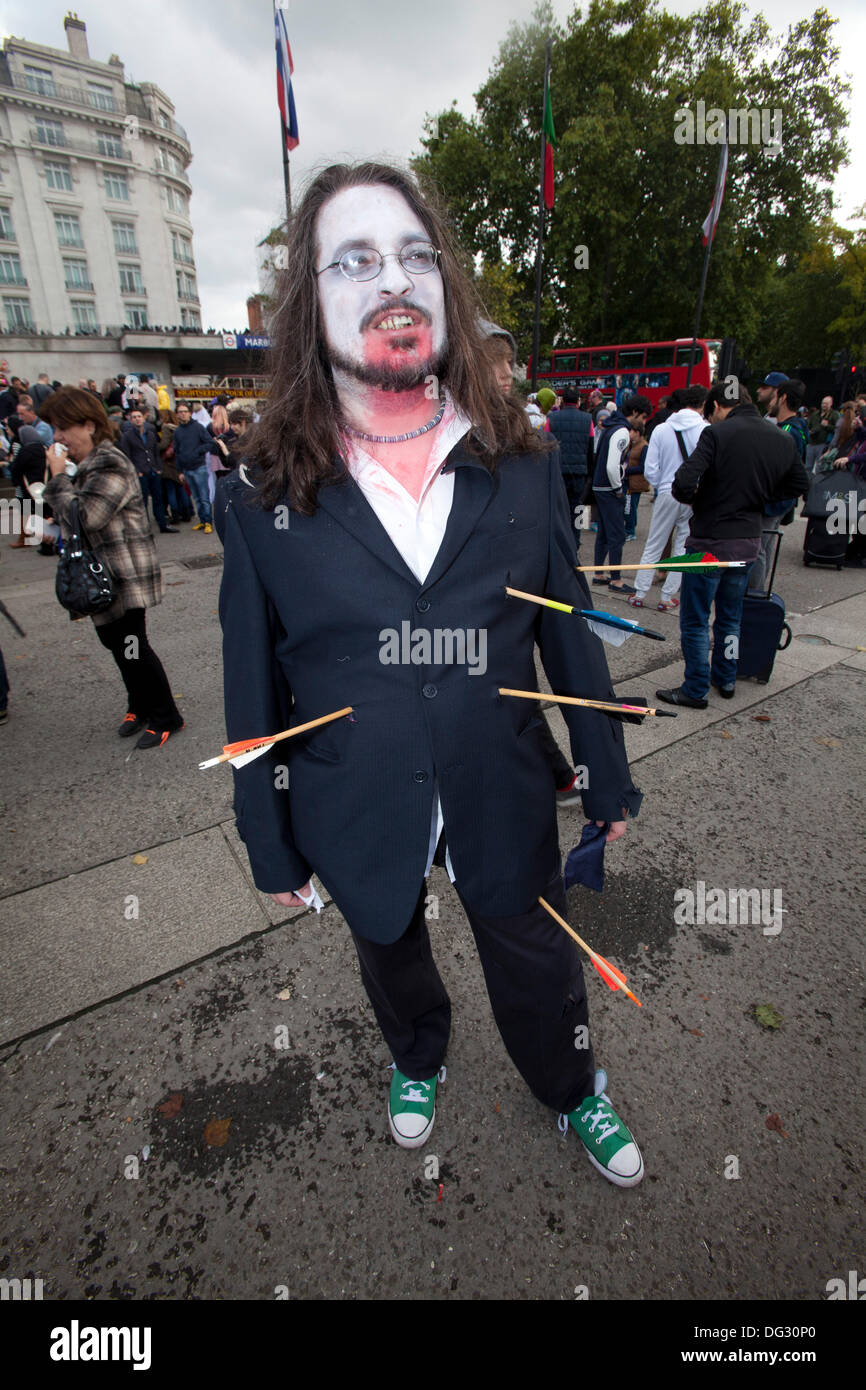 London, UK. 12th Oct 2013. London attracts thousands of zombies each year to groan and shamble through Central London in aid of the charity St. MungoÕs. Stock Photo