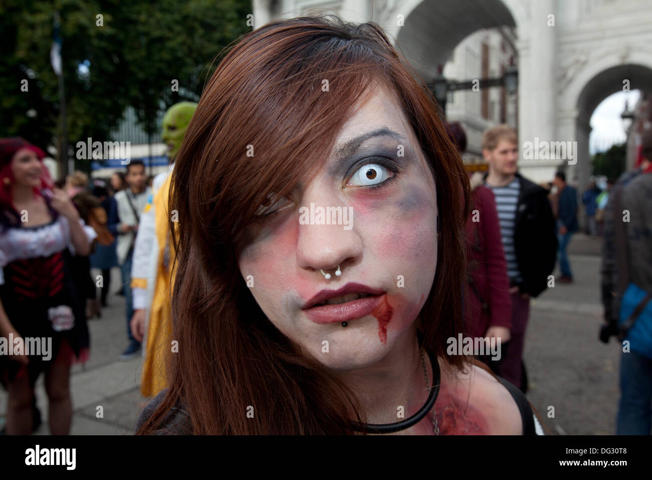 London, UK. 12th Oct 2013. London attracts thousands of zombies each year to groan and shamble through Central London in aid of the charity St. MungoÕs. Stock Photo