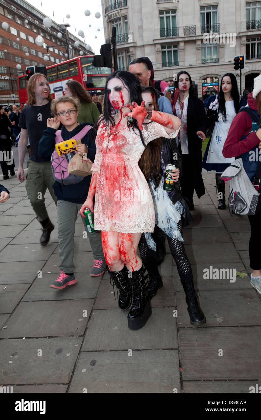 London, UK. 12th Oct 2013. London attracts thousands of zombies each year to groan and shamble through Central London in aid of the charity St. MungoÕs. Stock Photo