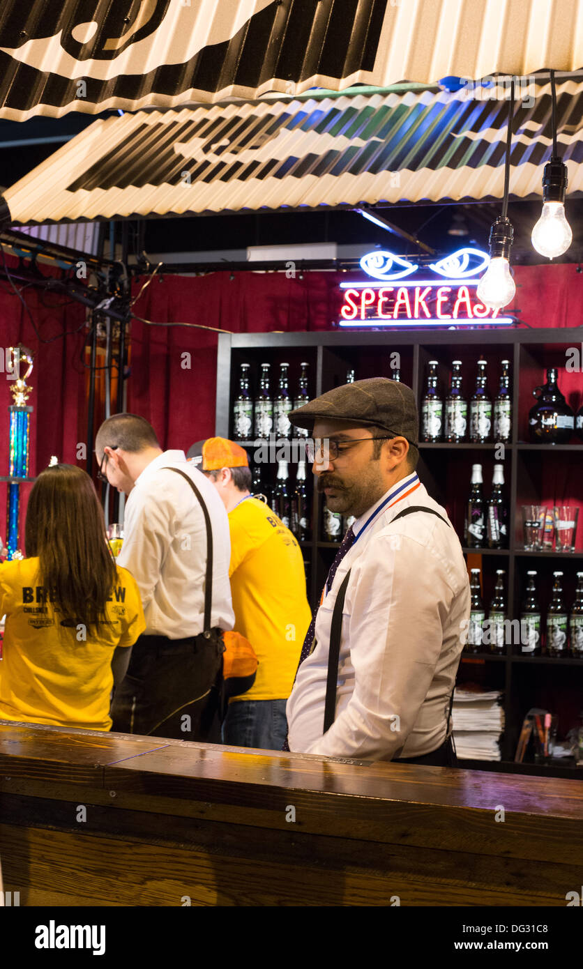 Denver, CO  Oct. 12, 2013. Representatives of the Speak Easy Brewery prepare for participants who will sample their beer during the 2013 Great American Beer Festival.  © Ed Endicott/Alamy Live News Stock Photo