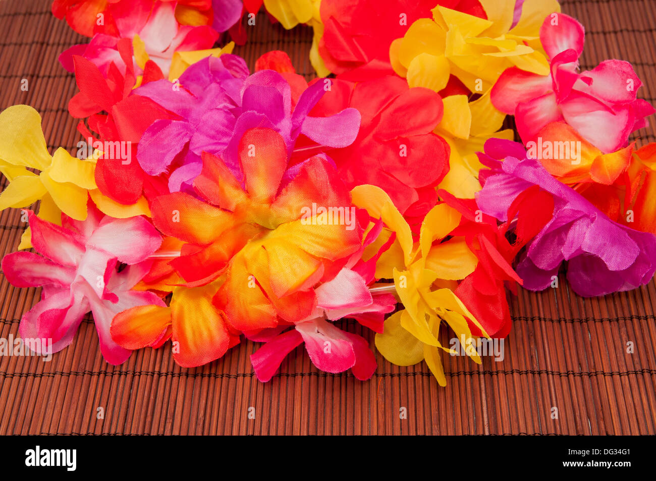 colored flowers on a wooden background Stock Photo