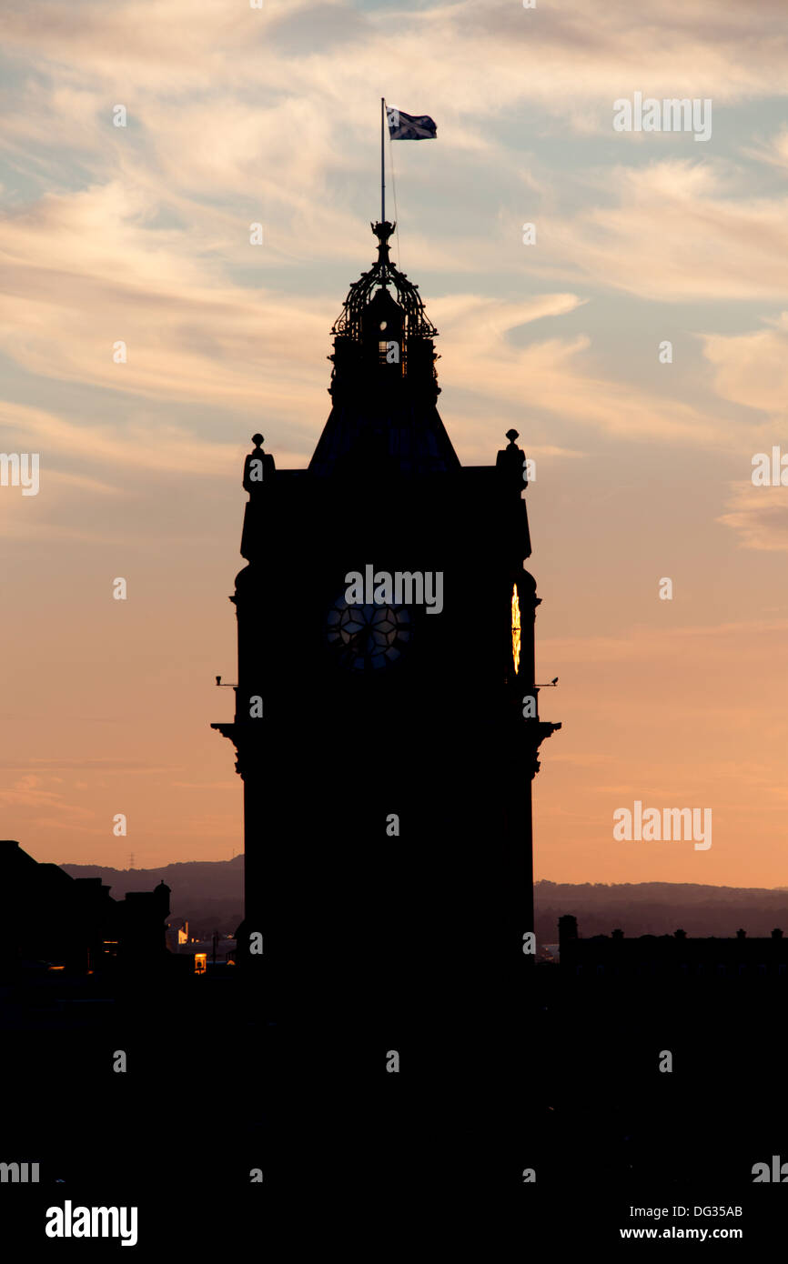 City of Edinburgh, Scotland. Silhouette close up view of the Balmoral Hotel clock tower on Princes Street. Stock Photo