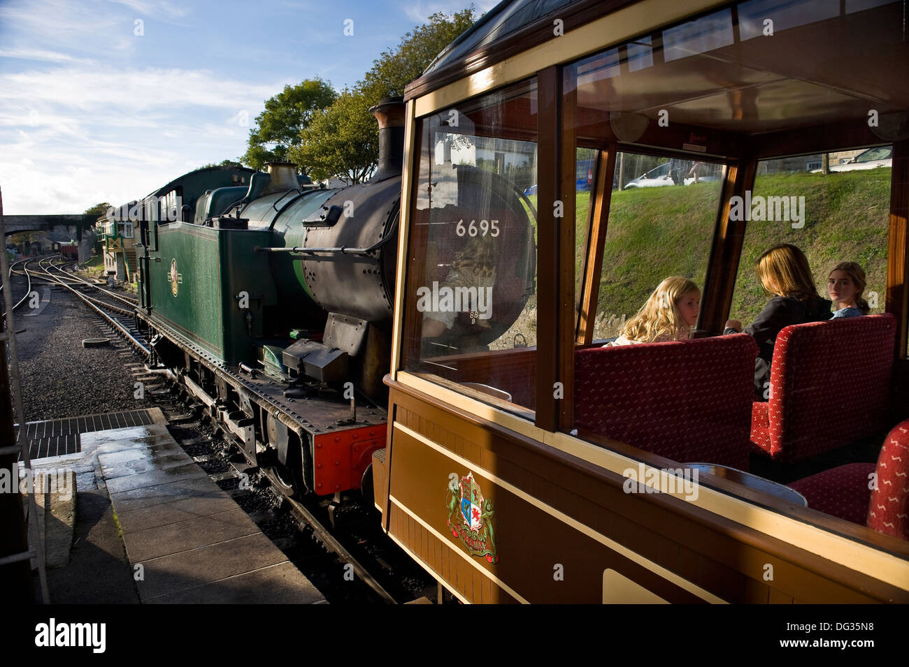 The observation car pulled by a steam on the Swanage Railway