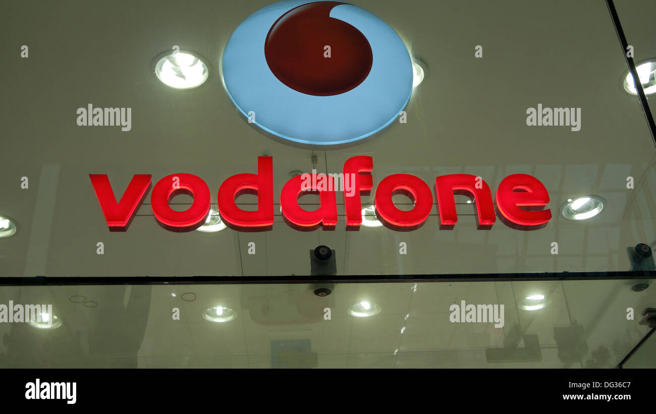 Vodafone sign and logo in shop window Wales UK Stock Photo