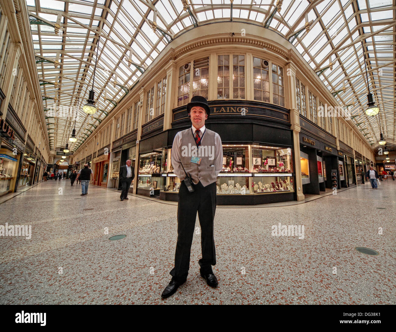 Concierge security man at Argyll Arcade Victorian Glasgow shopping mall , Scotland, UK Stock Photo