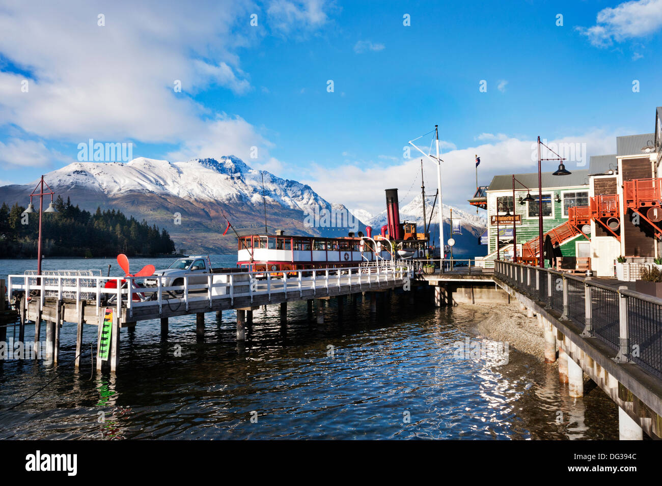 Queenstown, South Island, New Zealand. The steam cruise ship TSS Earnslaw moored at the wharf on Lake Wakatipu Stock Photo