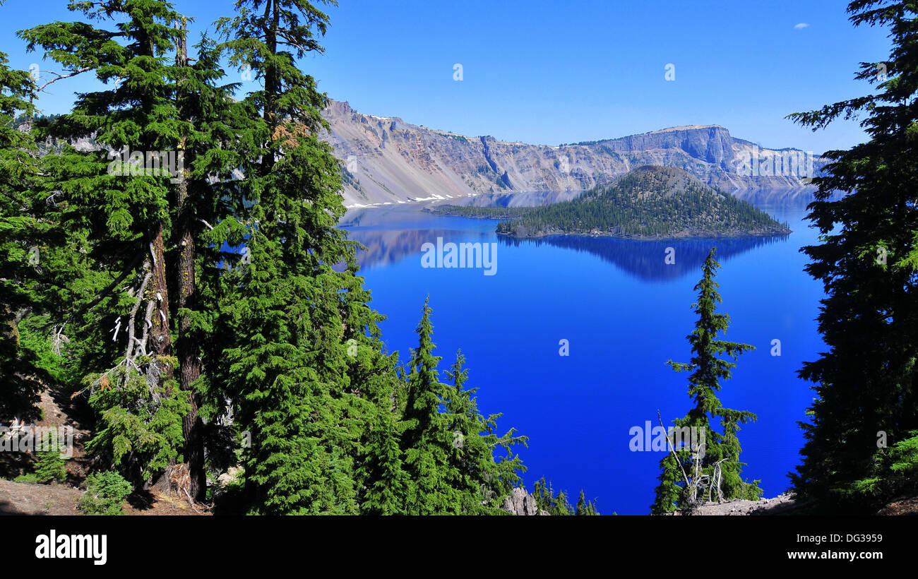 Crater lake in Oregon VS visited in the early morning. This is the lake as blue I have ever seen. Stock Photo