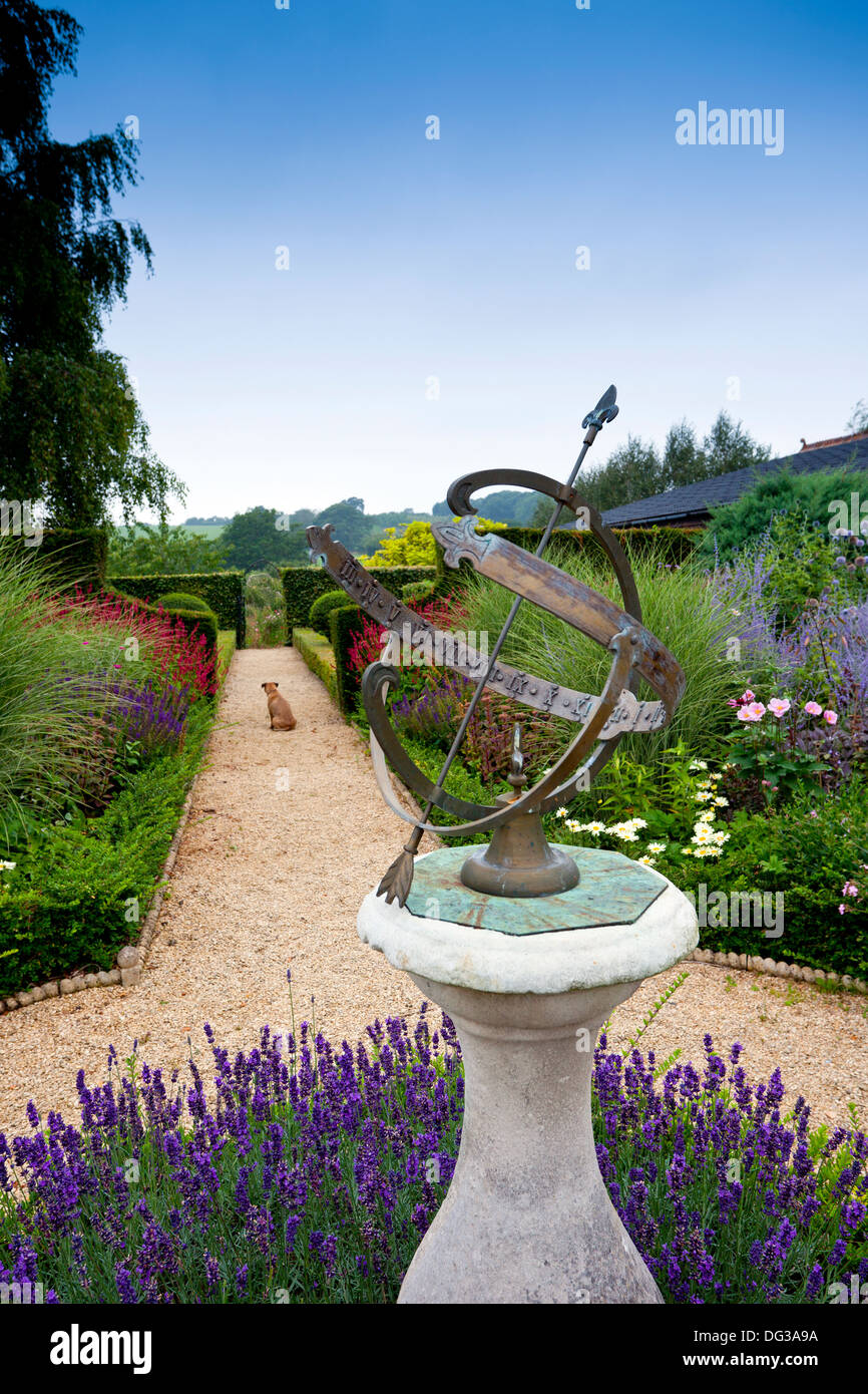 A sundial in the formal garden at Lady Farm, Chelwood, nr Bath, Somerset, England UK Stock Photo