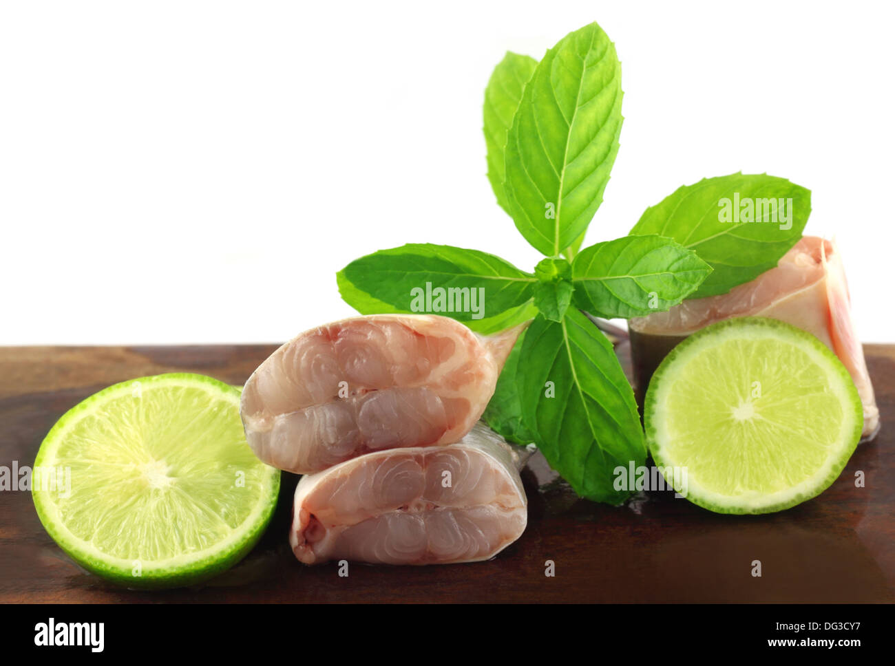Rita fish of Southern Asia with mint and lemon Stock Photo