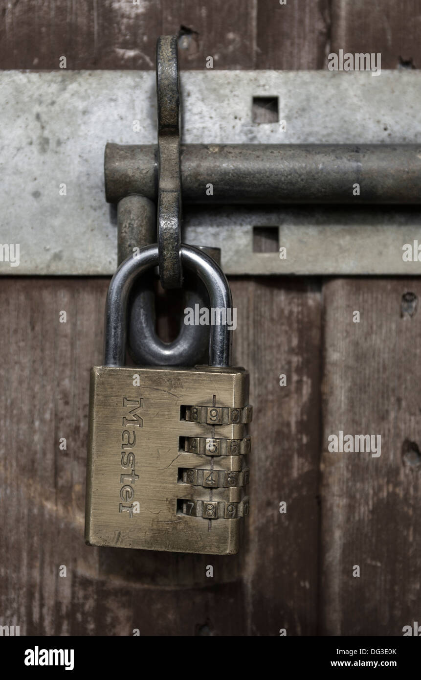 A combination padlock on a shed door. Stock Photo