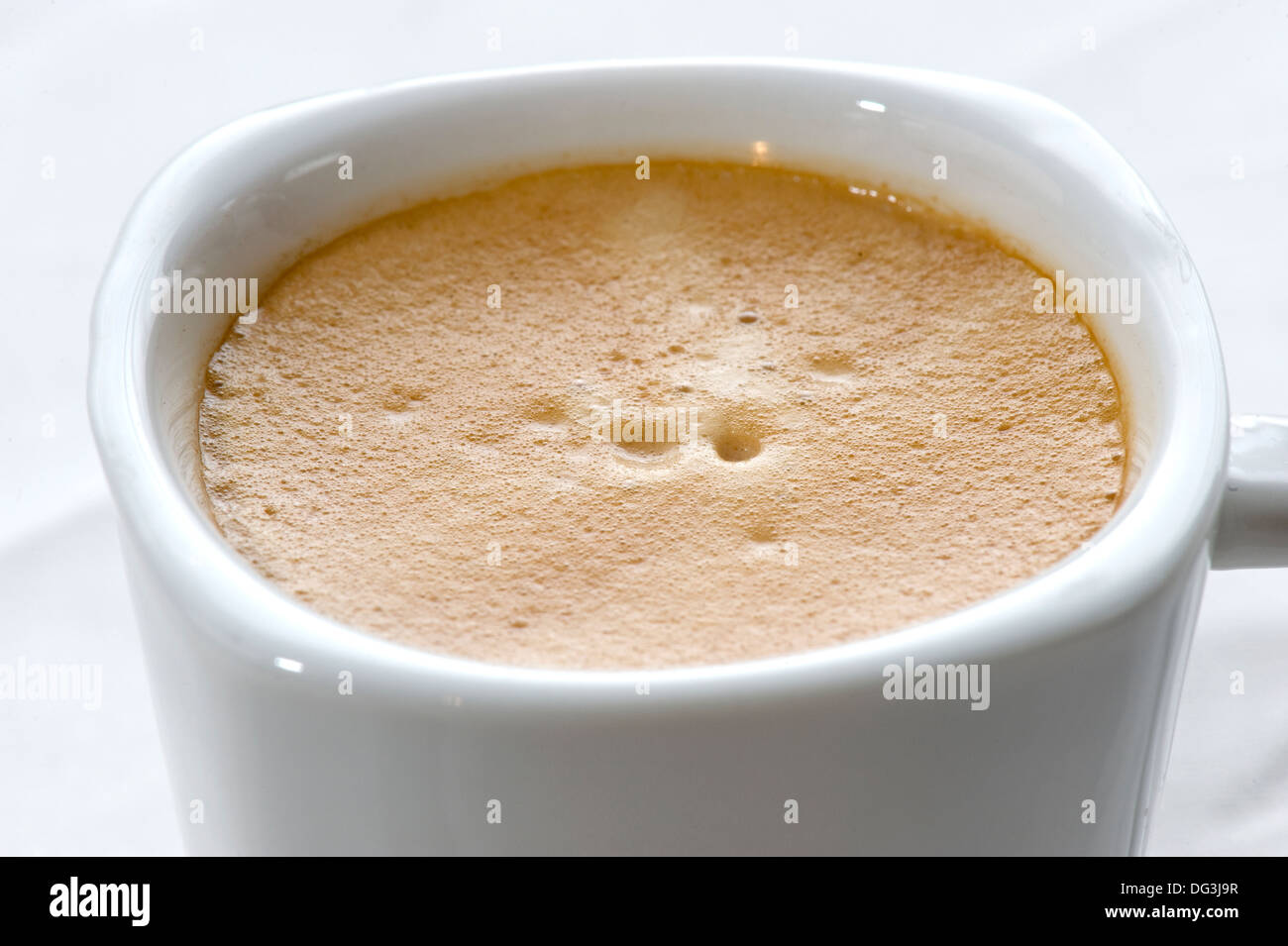A close up of coffee in an espresso cup Stock Photo