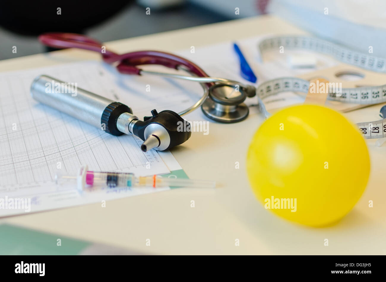 Pediatrician medical tools on the table Stock Photo - Alamy