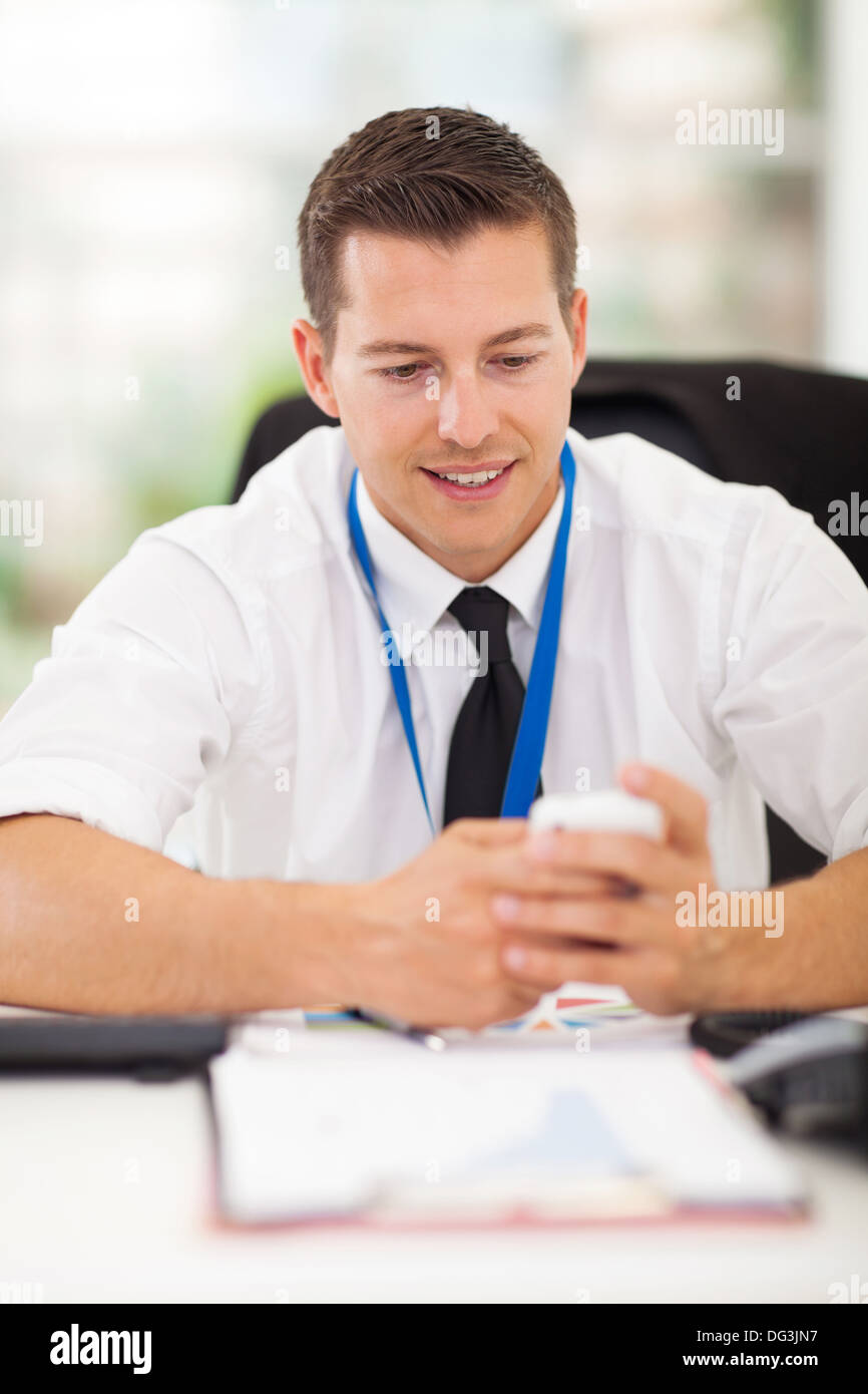 handsome businessman using smart phone Stock Photo