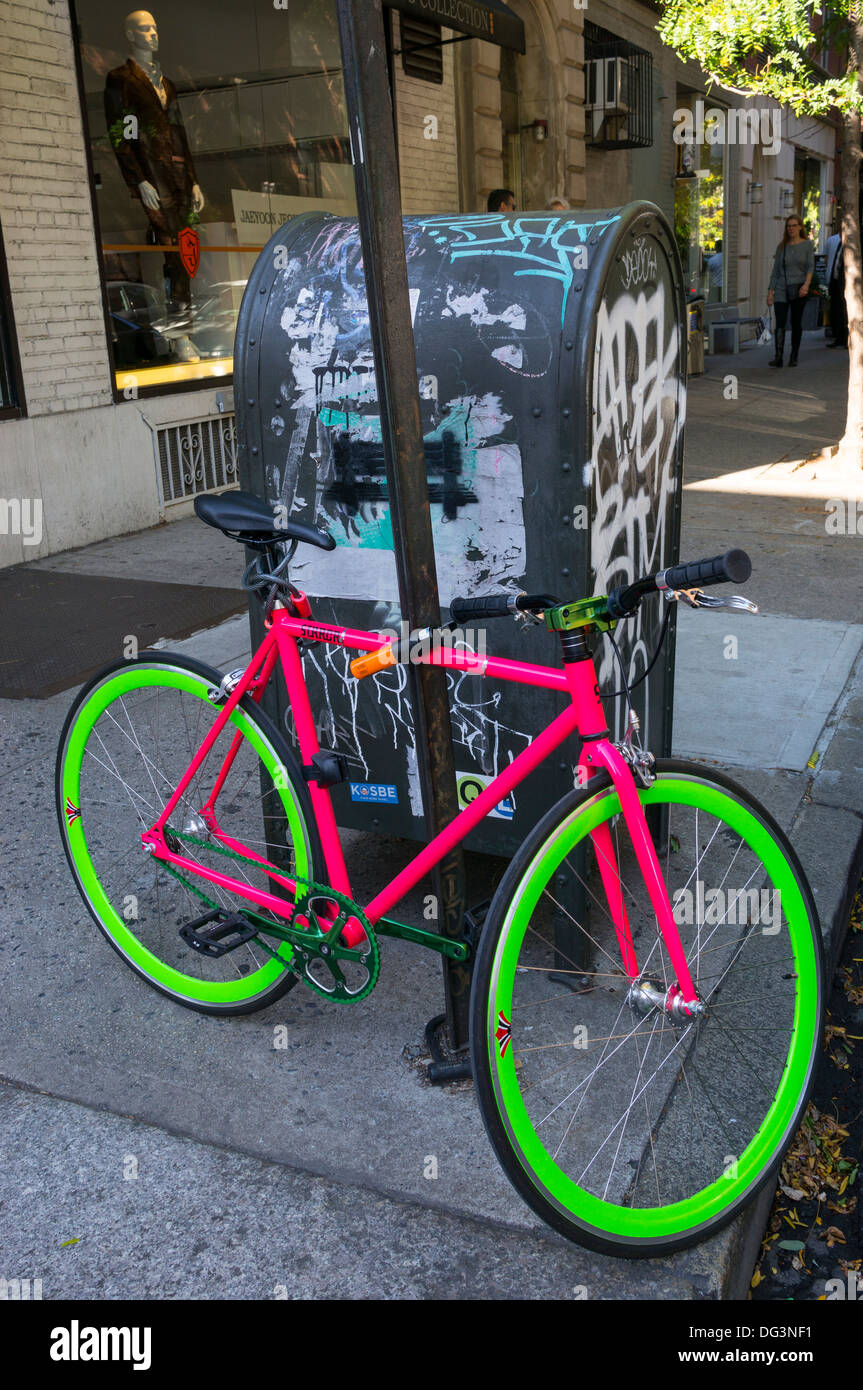 Brightly colored bike street bike in Nolita in New York City Stock Photo