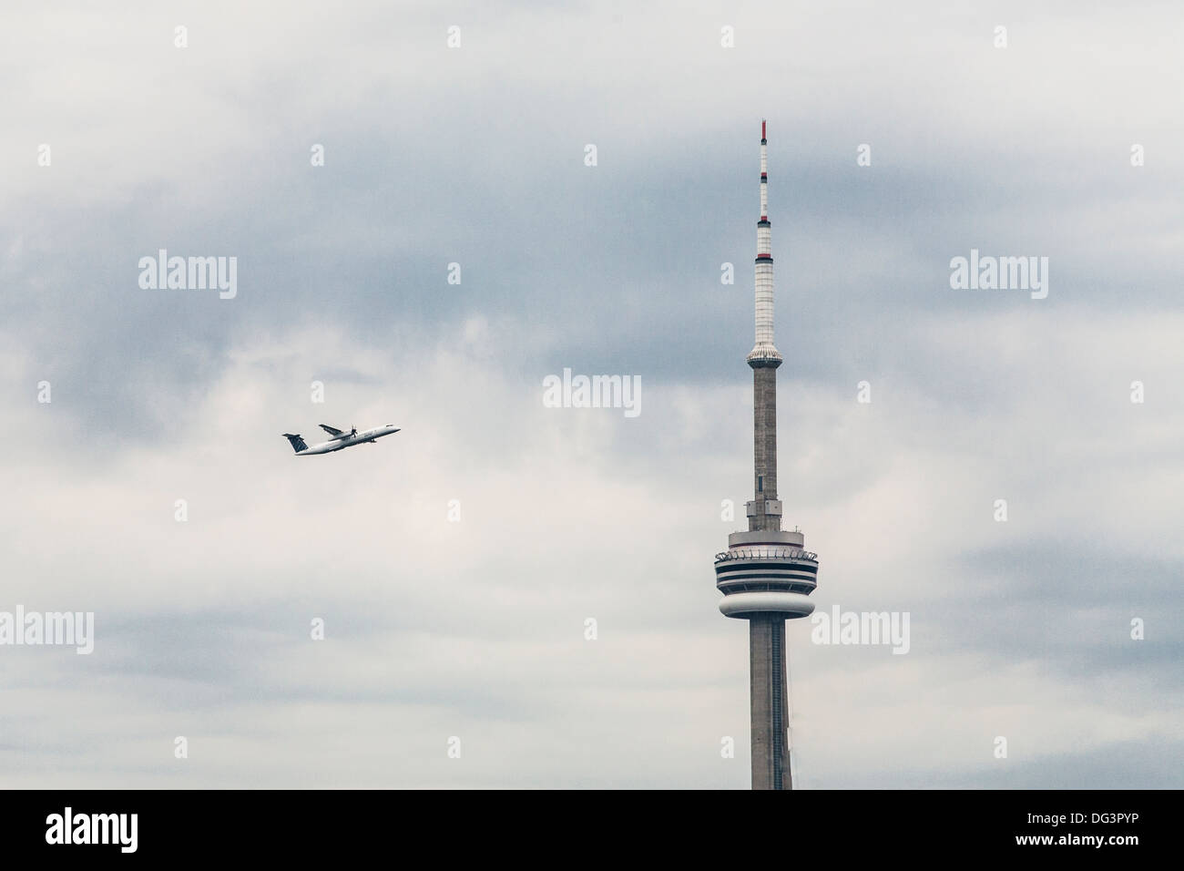 A Porter Airlines airplane takes off from Billy Bishop Toronto City Airport. Stock Photo