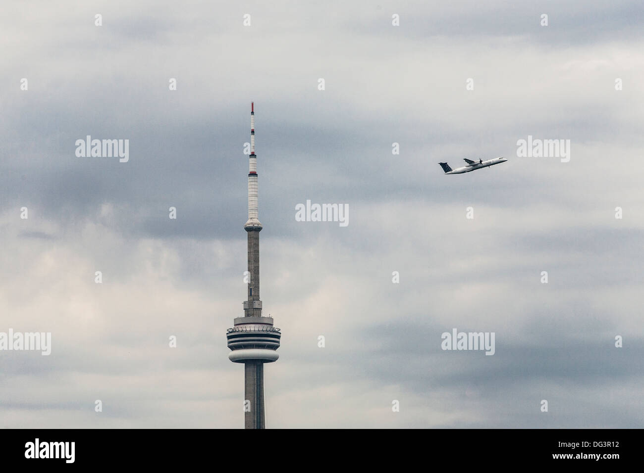 A Porter Airlines airplane takes off from Billy Bishop Toronto City Airport. Stock Photo