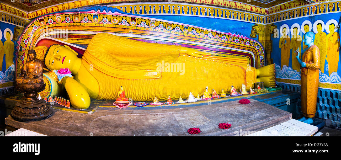 Golden reclining Buddha at Temple of the Tooth (Temple of the Sacred Tooth Relic) in Kandy, Sri Lanka, Asia Stock Photo