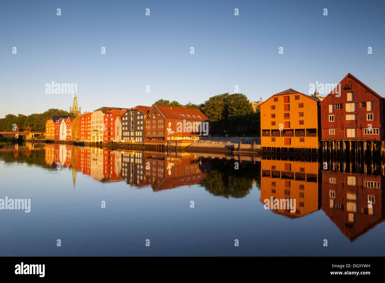 Old fishing warehouses reflected in the River Nidelva, Trondheim, Sor-Trondelag, Norway, Scandinavia, Europe Stock Photo