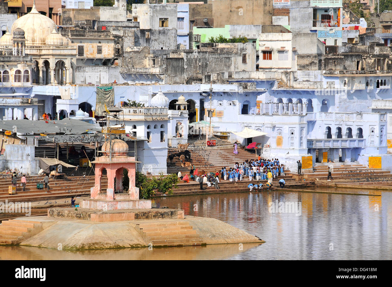 Ghats at Holy Pushkar Lake and old Rajput Palaces, Pushkar, Rajasthan, India, Asia Stock Photo