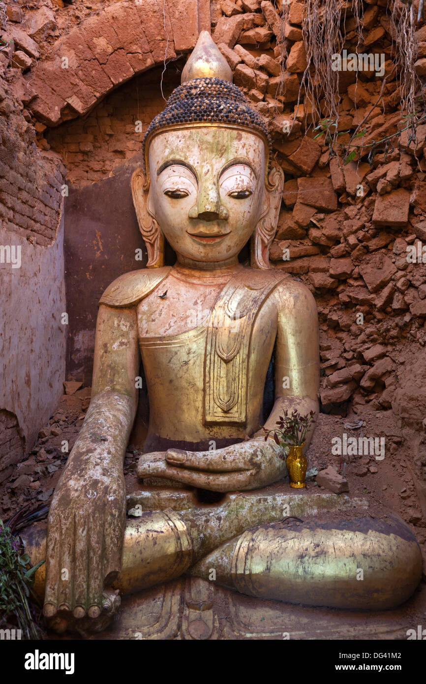 Buddha image inside a ruined stupa, Shwe Inn Thein Pagoda, Inle Lake, Shan State, Myanmar (Burma), Asia Stock Photo