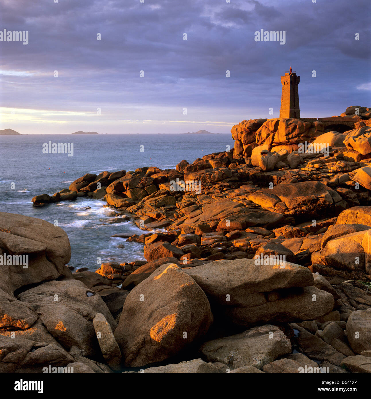 Ploumanach lighthouse on the Cote de Granit Rose (Pink Granite Coast), Cotes d'Armor, near Perros-Guirec, Brittany, France Stock Photo