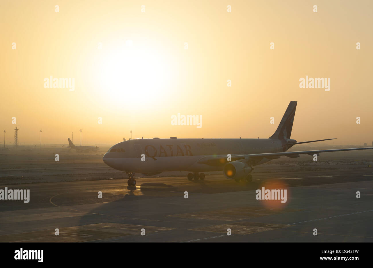 Qatar airways plane just landed at Doha airport, Qatar Stock Photo