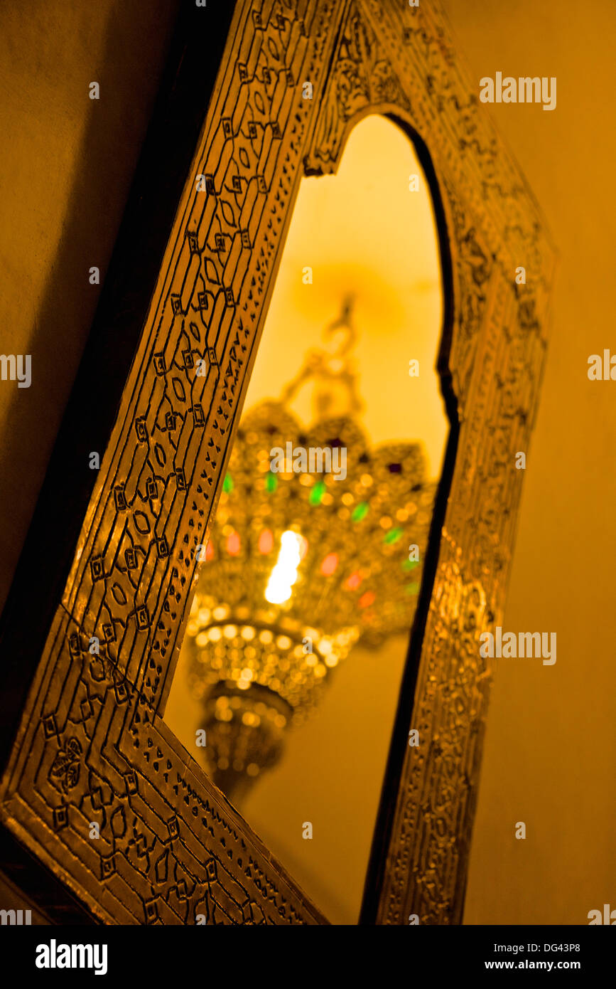 Brass ceiling lamp, reflected in typical mirror, Marrakech, Morocco, North Africa, Africa Stock Photo