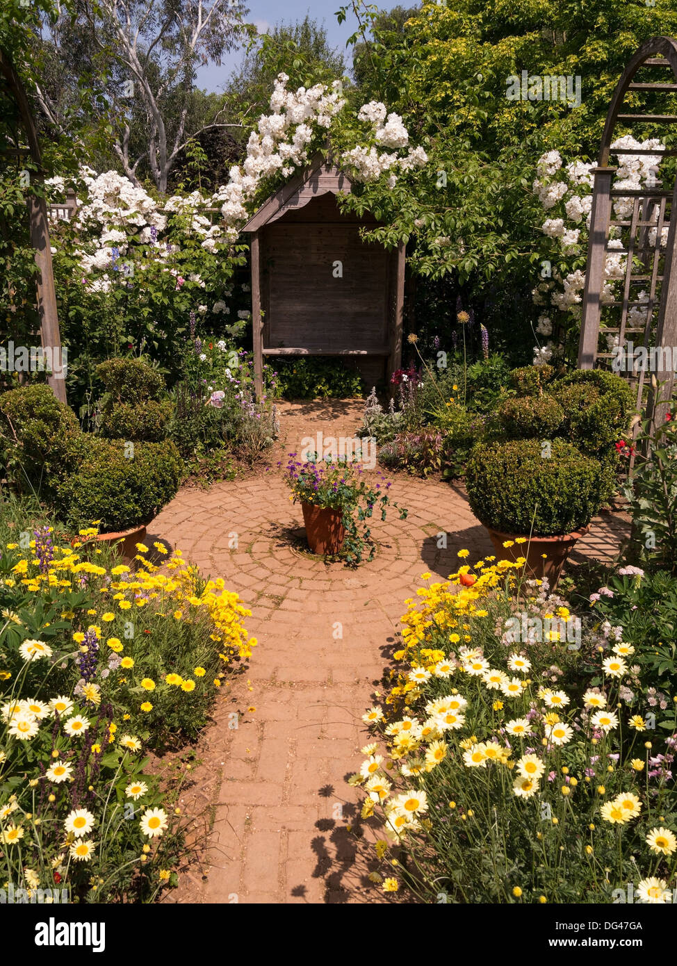 Garden Bench With Arbor Garden Seat Outside Cottage Hi Res Stock