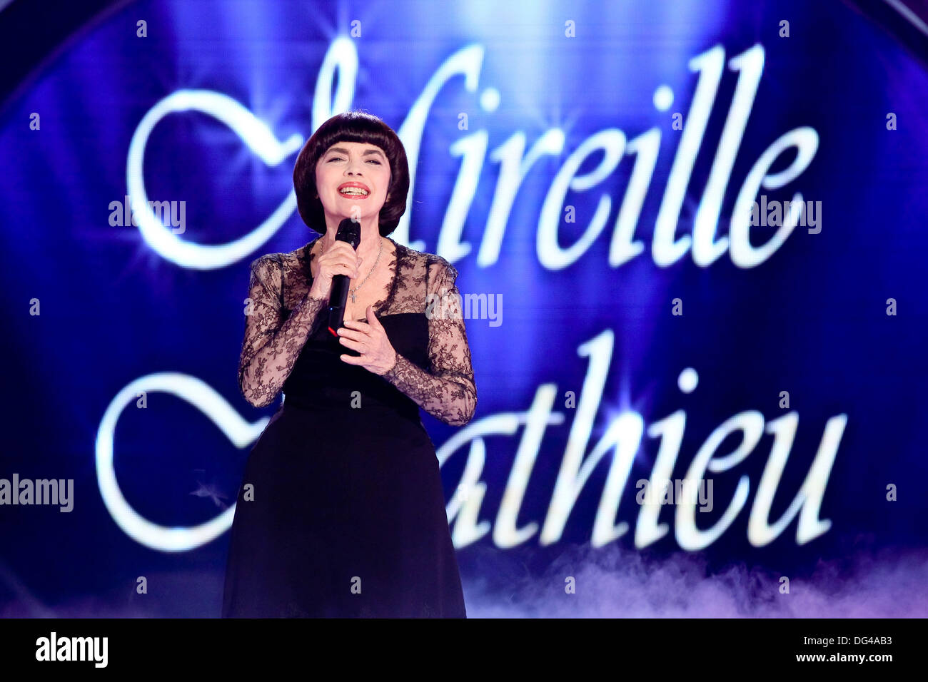 Erfurt, Germany. 12th Oct, 2013. French singer Mireille Mathieu performs onstage during the TV music show 'Herbstfest der Traeume' ('Autumn Festival of Dreams') in Erfurt, Germany, 12 October 2013. Photo: Andreas Lander NO WIRE/dpa/Alamy Live News Stock Photo
