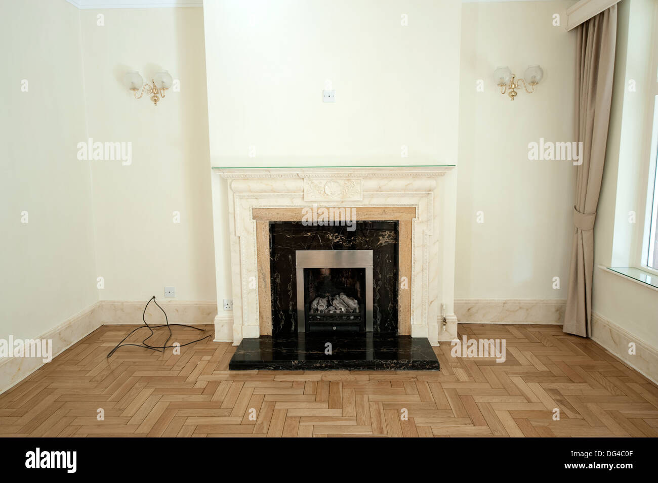 Fireplace in empty house moving out in buying selling Stock Photo