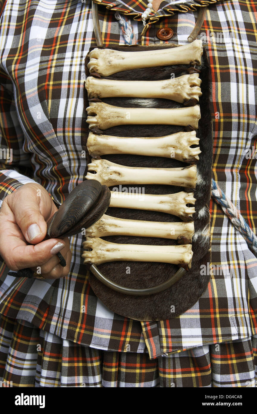 Woman with unusual musical instrument made from bones on Gran Canaria