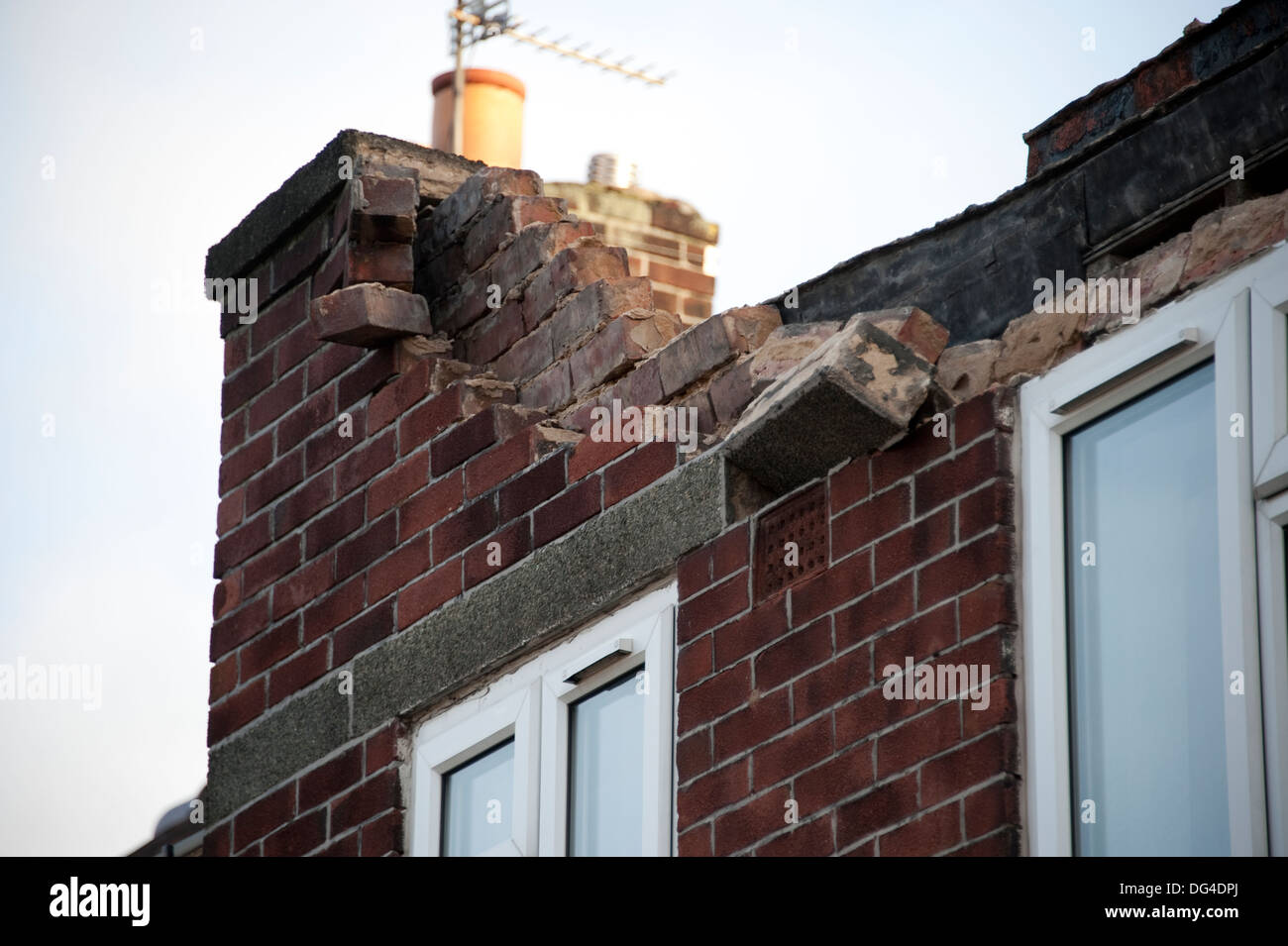 Brickwork fallen from house in high winds storm Stock Photo