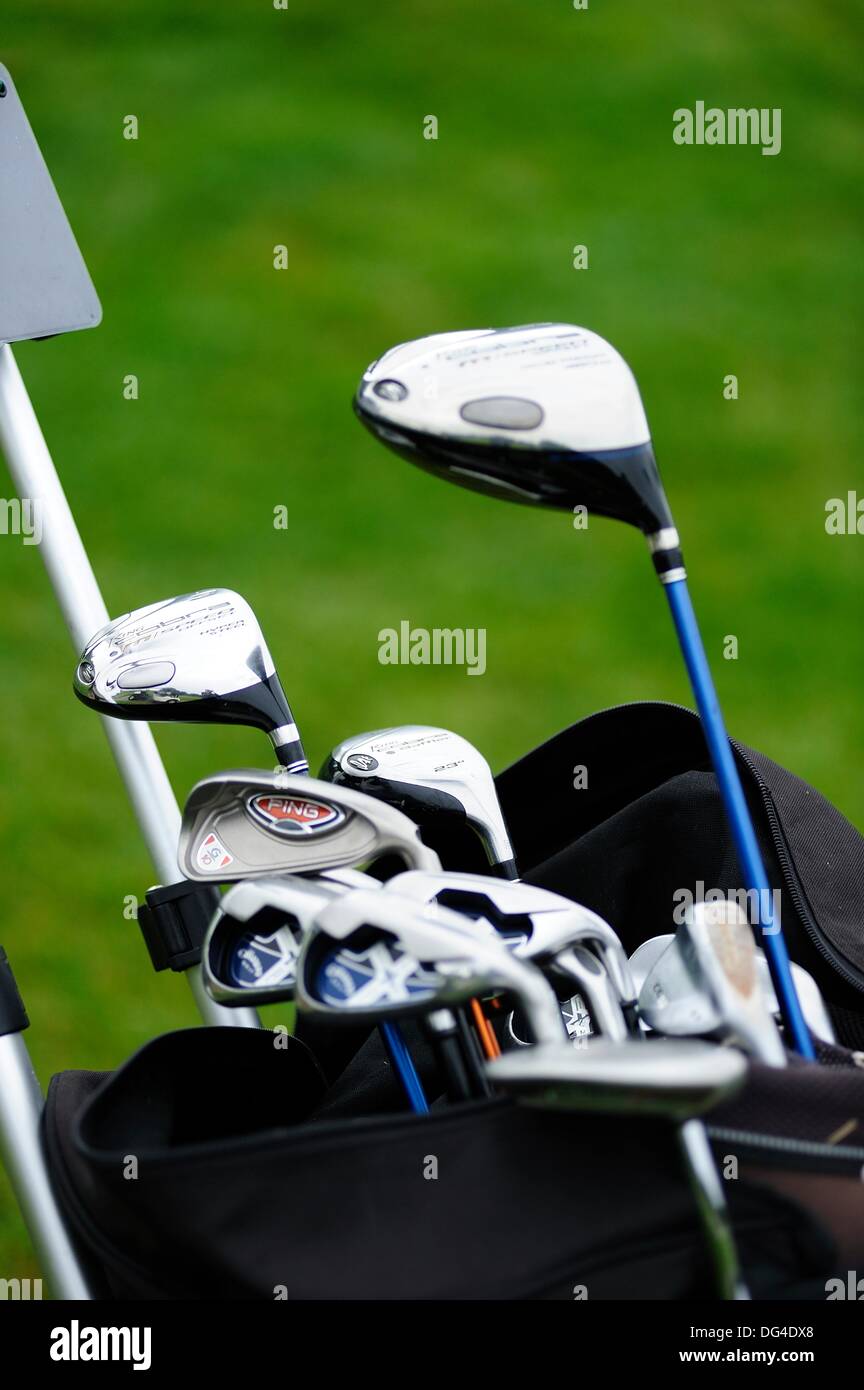 Vertical image of a set of golf clubs out of his bag Stock Photo