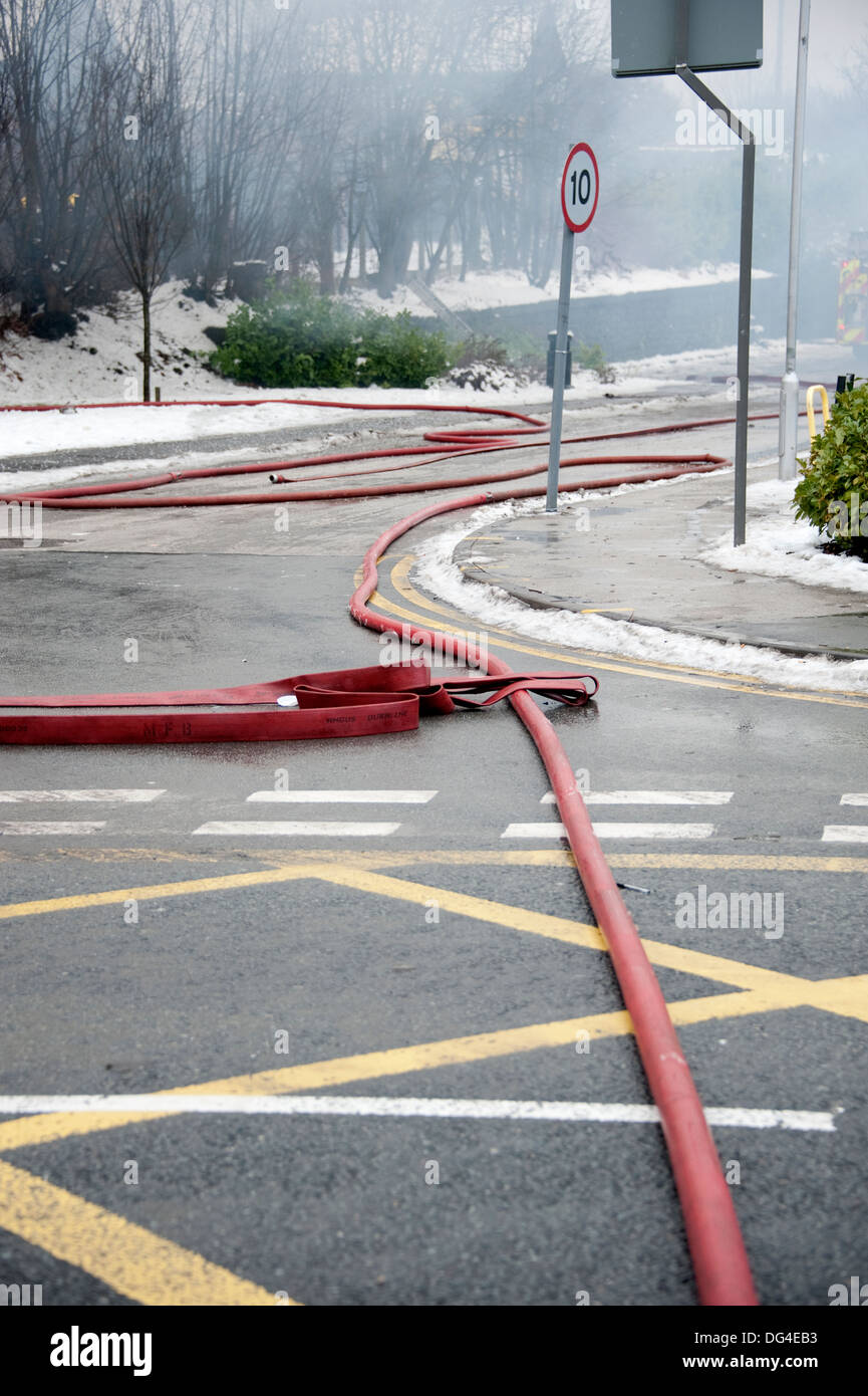 Fire Firemans Hose across Road Red Main Braches Stock Photo Alamy