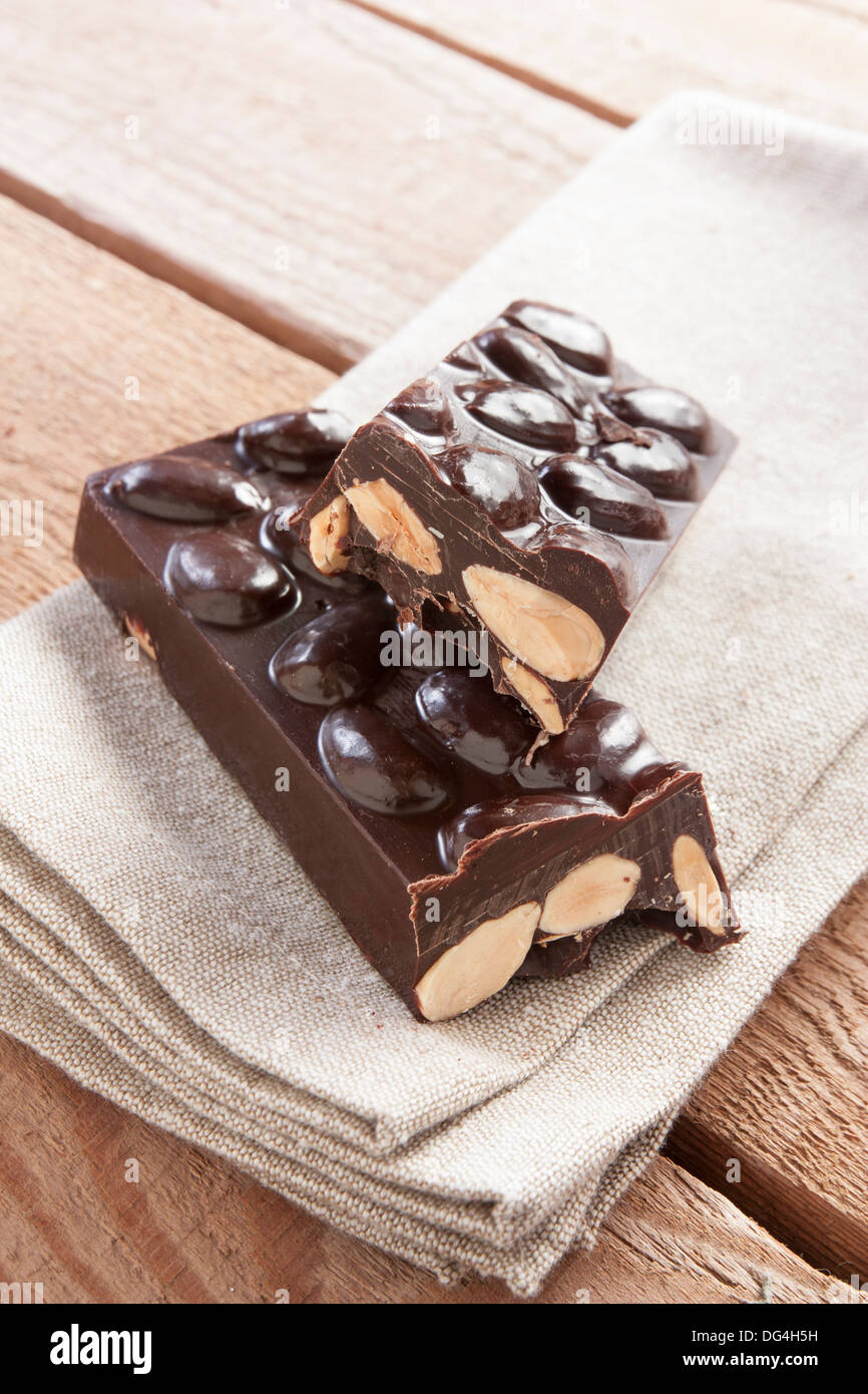 Delicious chocolate bar with almonds Stock Photo Alamy