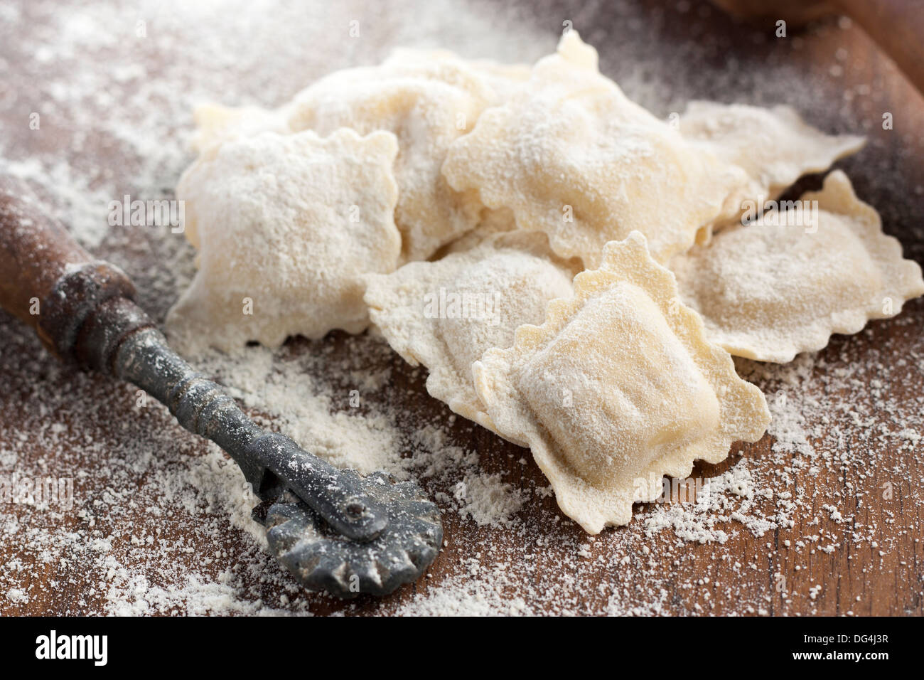 Preparing delicious homemade ravioli with a roller Stock Photo