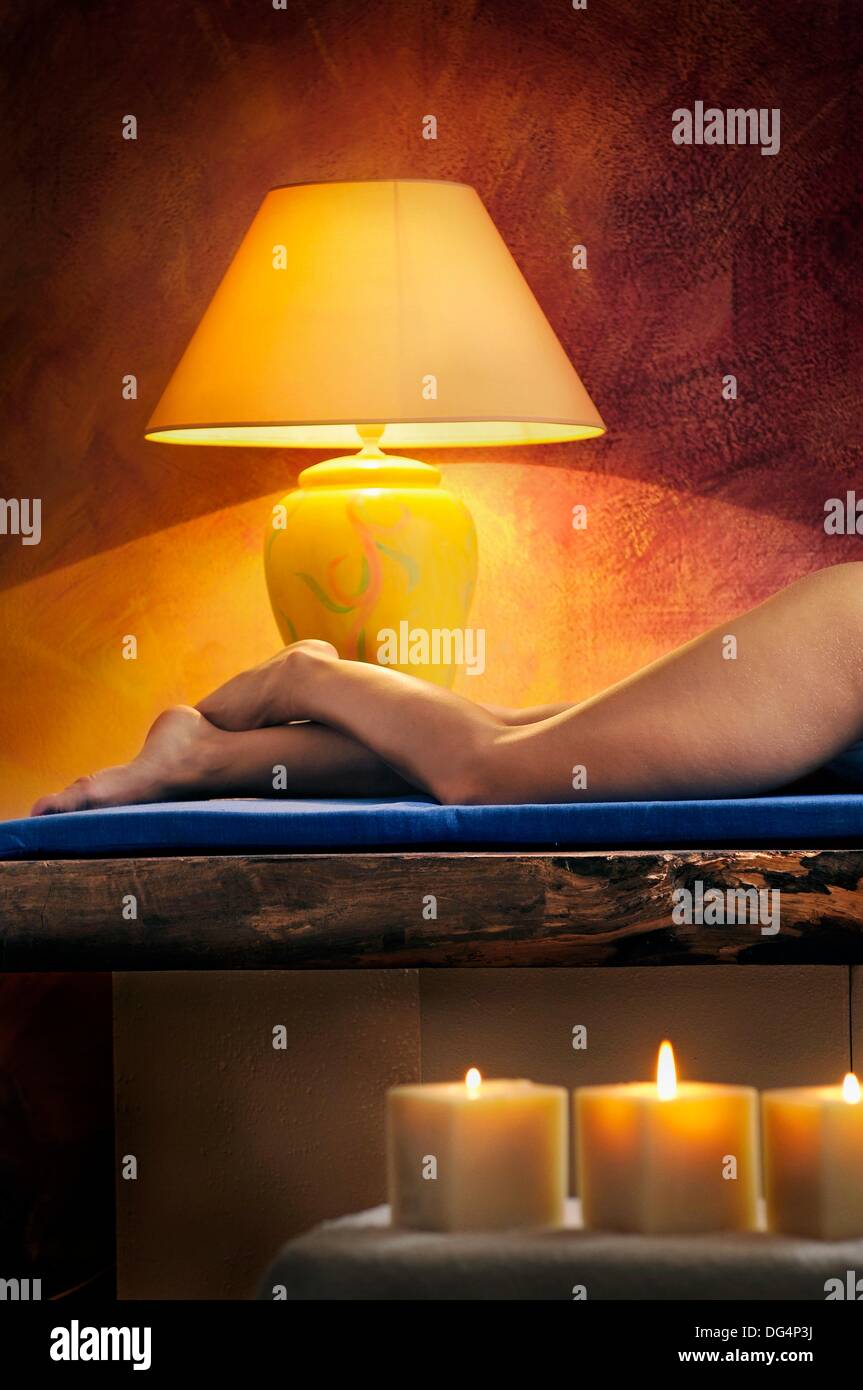 relaxed woman´s legs with candles Stock Photo