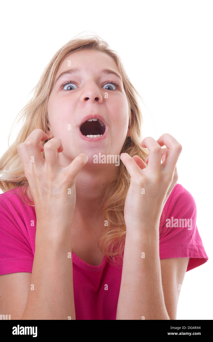 Angry girl in despair over white background Stock Photo - Alamy