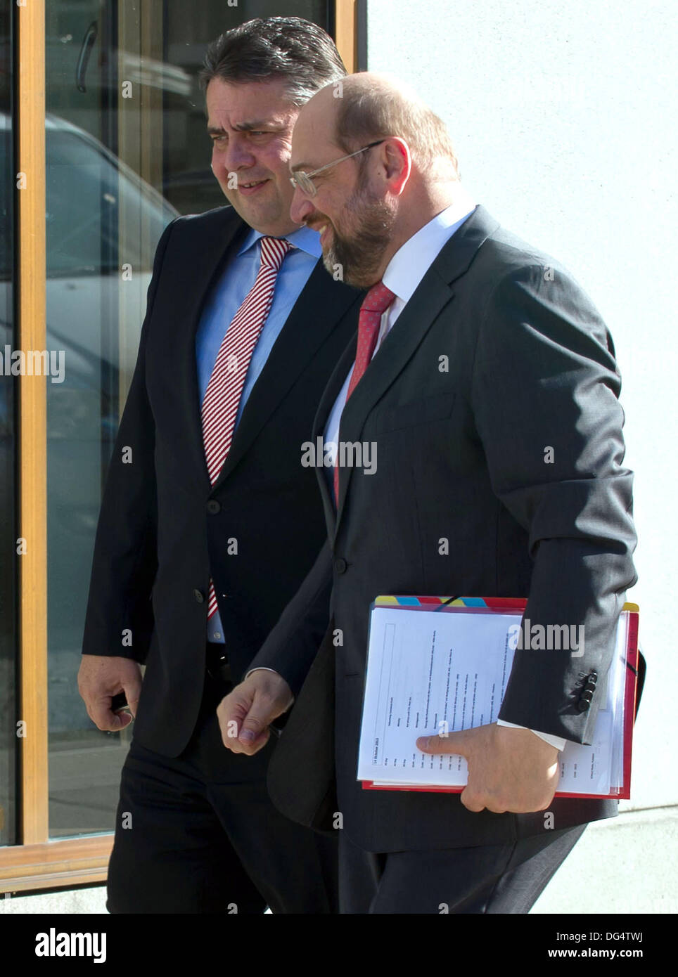 Berlin, Germany. 14th Oct, 2013. Chairman of the SPD, Sigmar Gabriel (L), and President of the European Parliament Martin Schulz (SPD) arrive at the Bundestag for exploratory coalition talks between the SPD and the CDU/CSU in Berlin, Germany, 14 October 2013. Photo: TIM BRAKEMEIER/dpa/Alamy Live News Stock Photo