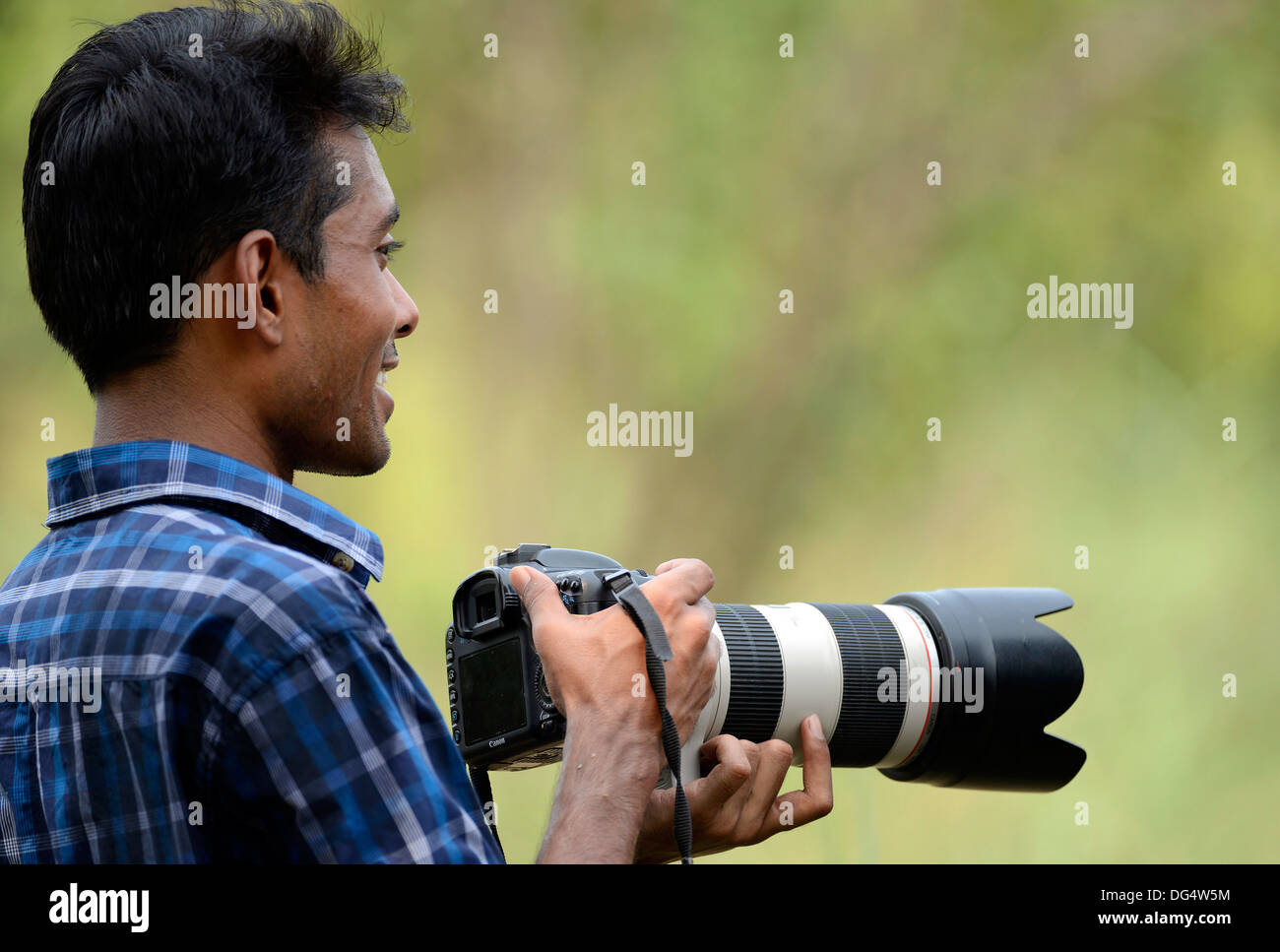 Wildlife photographer with camera hi-res stock photography and images ...