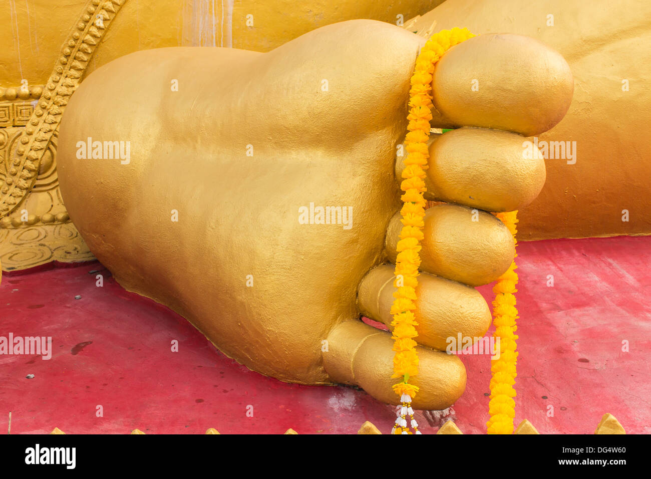 Foot of Golden statue of Ganesha Stock Photo