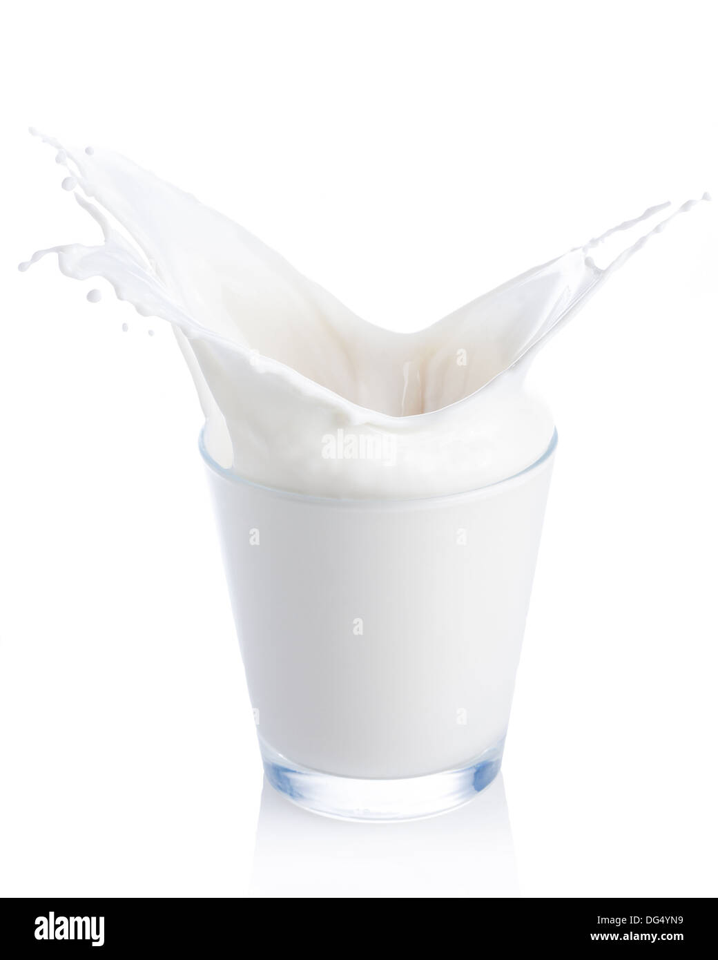 Milk splash on white background Stock Photo - Alamy