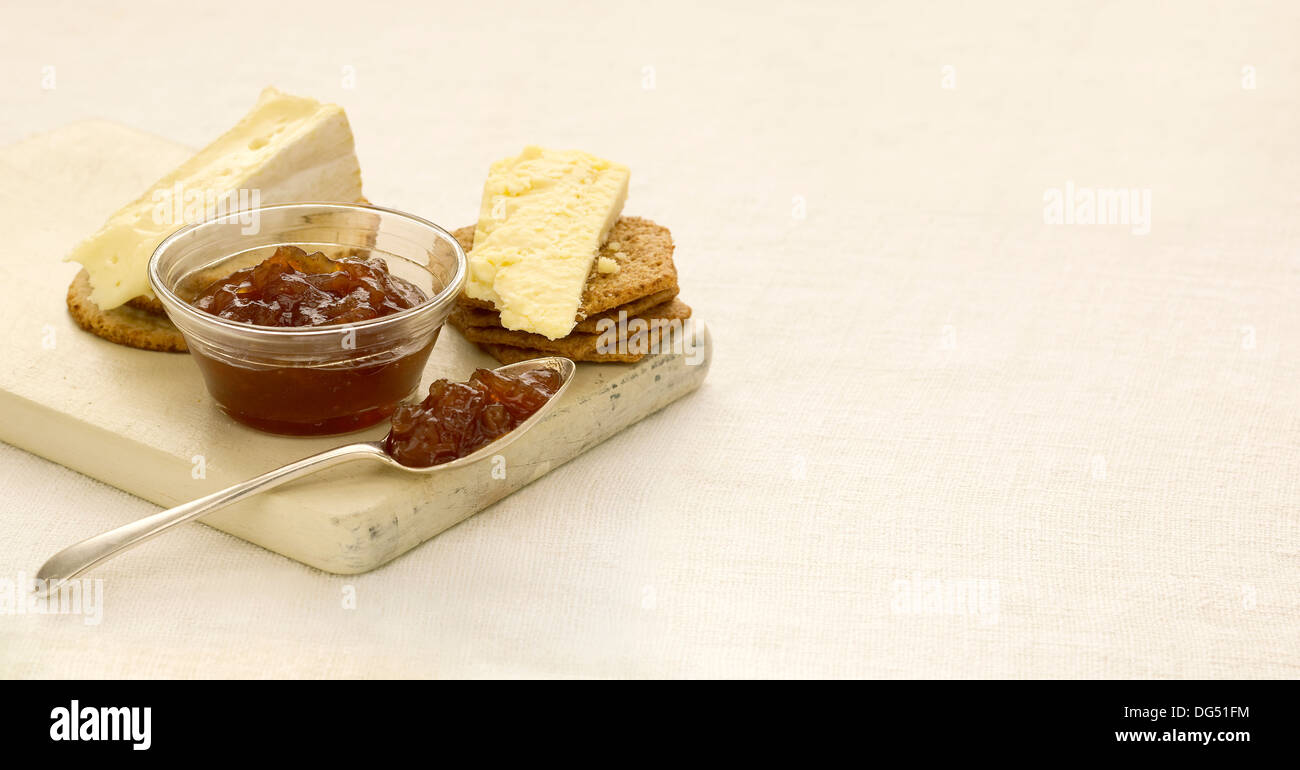 Cheese & Crackers with Caramelized Onion Chutney and crackers Stock