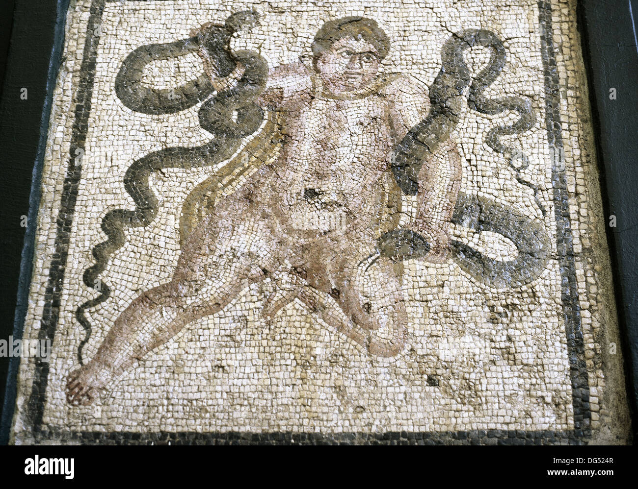 Heracles. Divine hero in Greek mythology. Roman mosaic. Child Heracles with snakes. Antakya. Turkey. Stock Photo