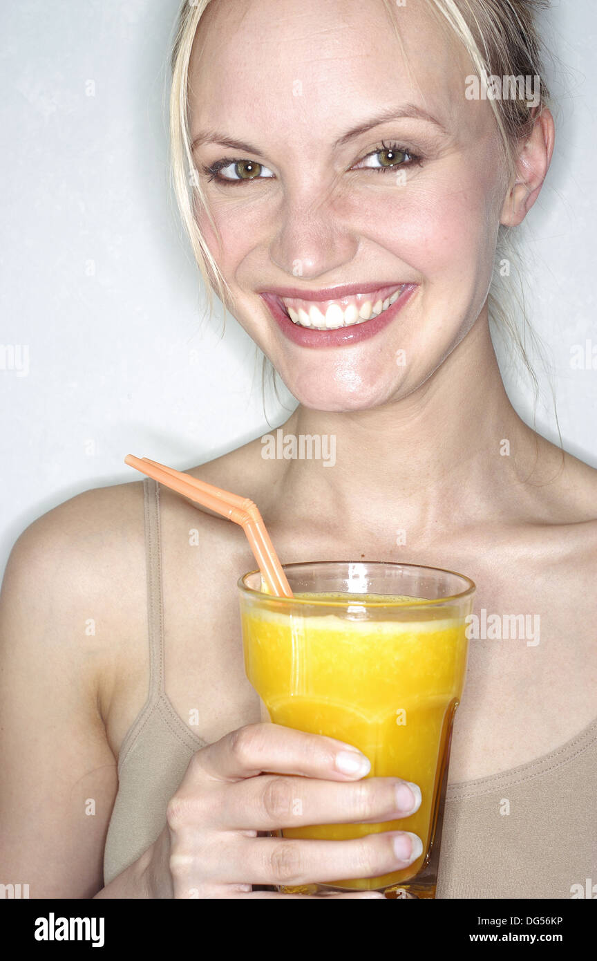Woman with orange juice Stock Photo Alamy